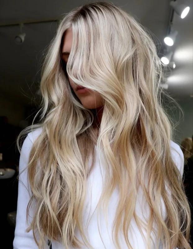 Long blonde invisible bead extensions